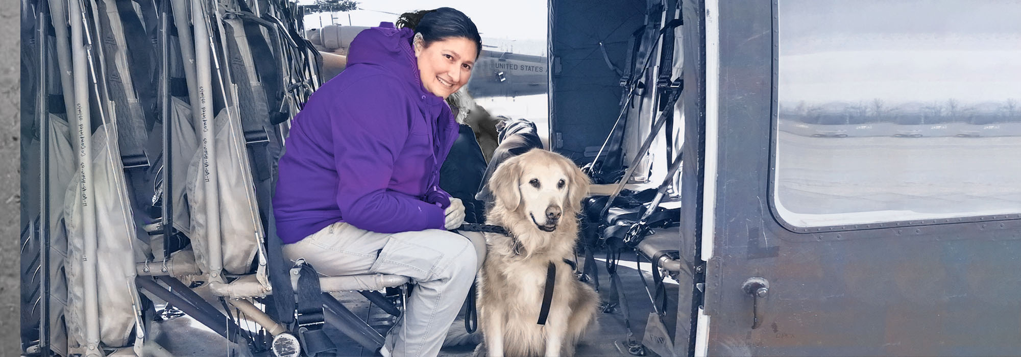 Crisis Response Canine team sitting in a helicopter; noise and foreign situations are part of crisis response canine training.